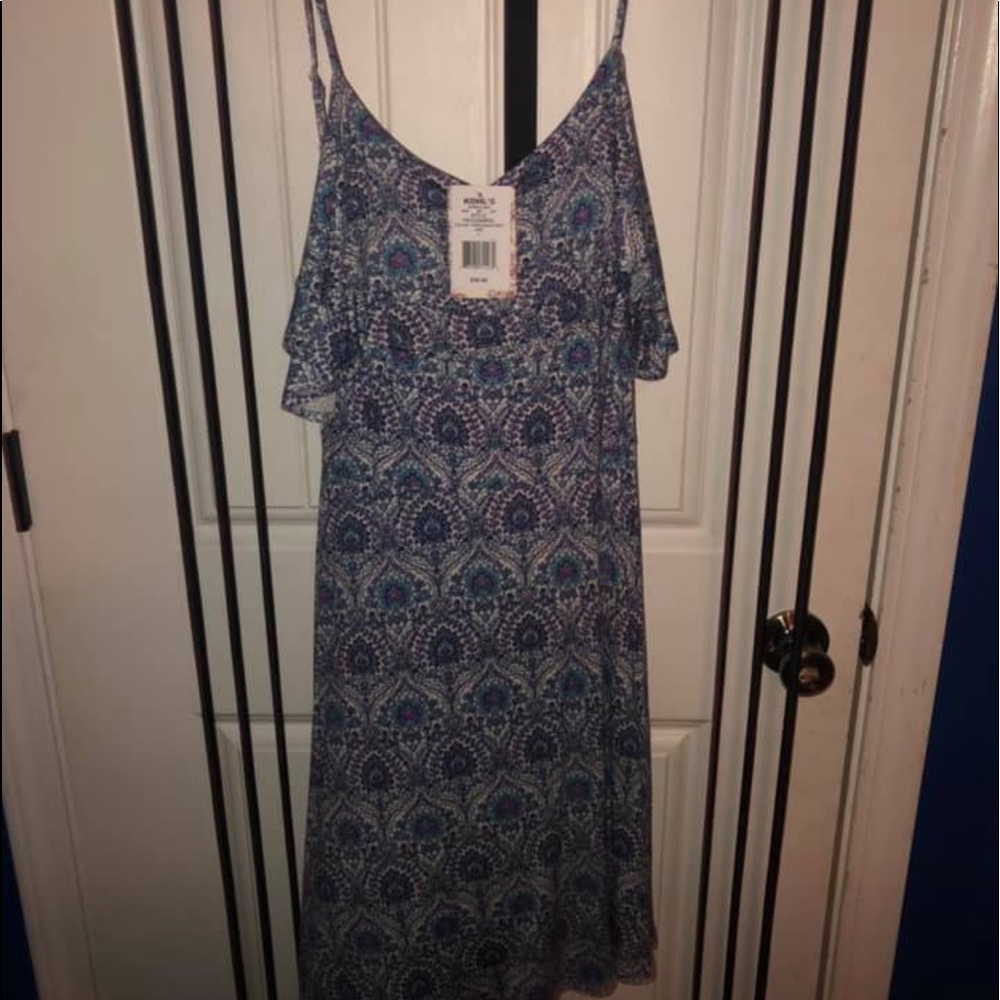 Spaghetti strapped thigh length dress
